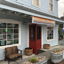 Light blue facade of the Bodega County Store.